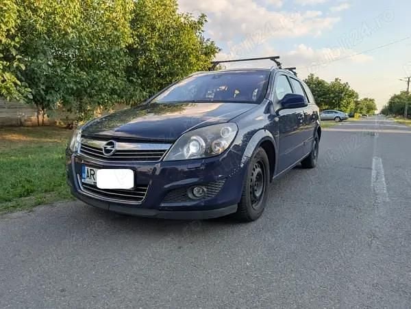 Albastru Utilizat 2010 Opel Astra Break | 2.350 EUR (Preț OK) - Imagine 1/4