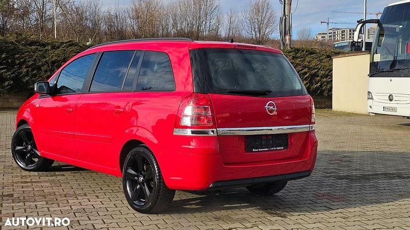 Second-hand Opel Zafira Family 140 CP (102 kW) 2013 Culoarerosu Monovolum