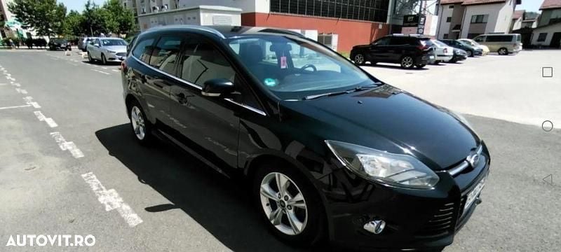 Culoarenegru Utilizat 2013 Ford Focus Titanium Break | 4.450 EUR (Preț bun) - Imagine 1/4
