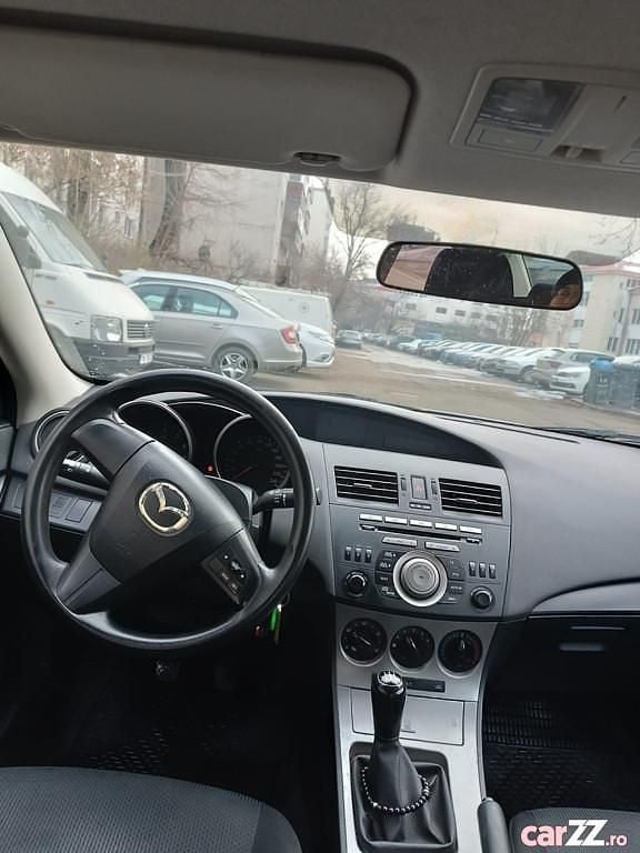 Second-hand Mazda 3 105 CP (77 kW) 2011 Culoareargint Berlinǎ