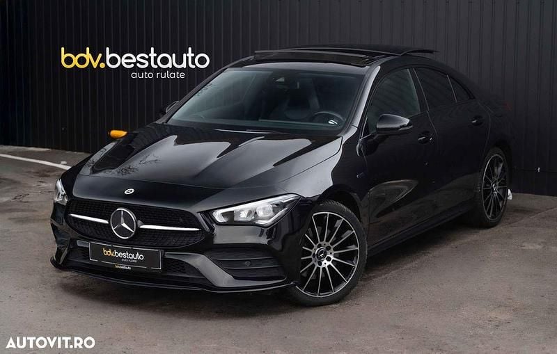 Culoarenegru Utilizat 2021 Mercedes CLA250e AMG line Berlinǎ | 25.990 EUR (Super Preț) - Imagine 1/4