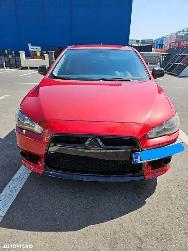 Culoarerosu Utilizat 2009 Mitsubishi Lancer Inform Break | 5.300 EUR - Imagine 1/4