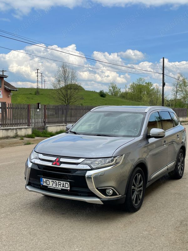 Gri Utilizat 2016 Mitsubishi Outlander SUV | 14.999 EUR - Imagine 1/4