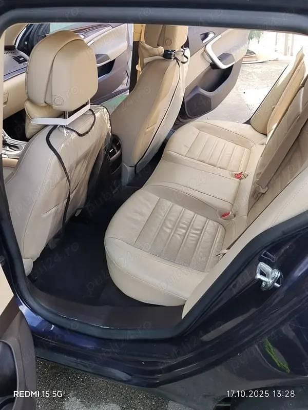 Second-hand Opel Insignia Sport 160 CP (117 kW) 2013 Albastru Break