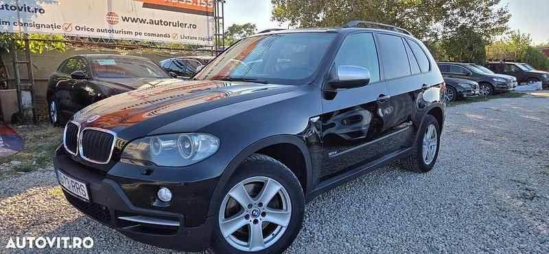 Culoarenegru Utilizat 2009 BMW X5 Exclusive SUV | 8.200 EUR (Preț bun) - Imagine 1/4