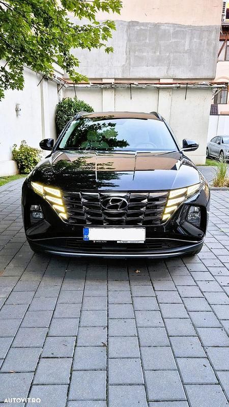 Culoarenegru Utilizat 2021 Hyundai Tucson Premium SUV | 23.990 EUR (Preț bun) - Imagine 1/4