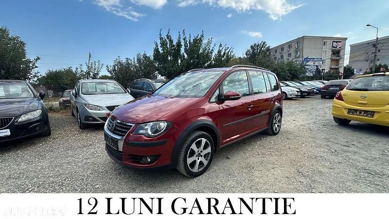 Culoarerosu Utilizat 2009 VW Touran Monovolum | 5.250 EUR - Imagine 1/4