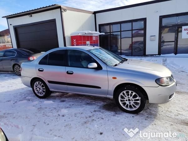 Second-hand Nissan Almera 116 CP (85 kW) 2005 Argintiu Berlinǎ