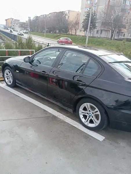 Second-hand BMW 318 143 CP (105 kW) 2010 Negru Berlinǎ