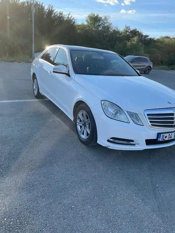 Second-hand Mercedes E200 136 CP (100 kW) 2012 Alb Berlinǎ