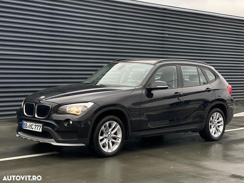 Culoarenegru Utilizat 2014 BMW X1 xLine SUV | 9.399 EUR (Super Preț) - Imagine 1/4