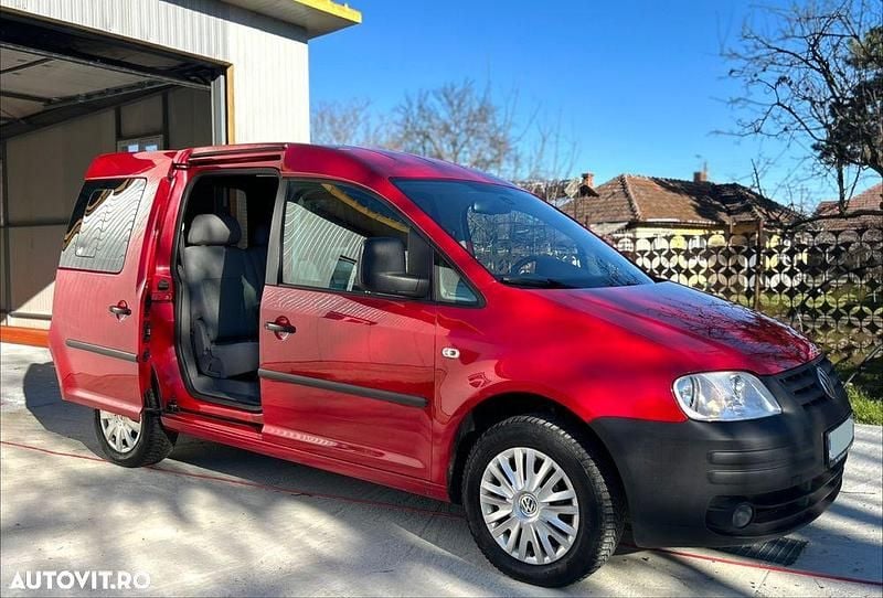 Second-hand VW Caddy 75 CP (55 kW) 2009 Culoarerosu Monovolum