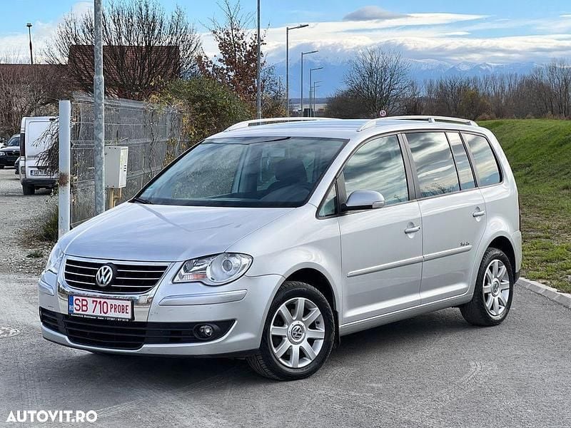 Second-hand VW Touran Comfortline 140 CP (102 kW) 2007 Culoareargint Monovolum