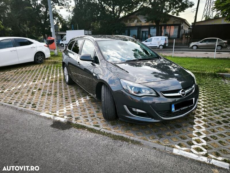 Gri Utilizat 2015 Opel Astra Design Edition Break | 6.400 EUR (Preț OK) - Imagine 1/4
