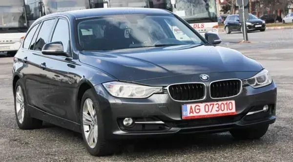 Gri Utilizat 2014 BMW 318 Sport Line Break | 8.700 EUR (Puțin scump) - Imagine 1/4