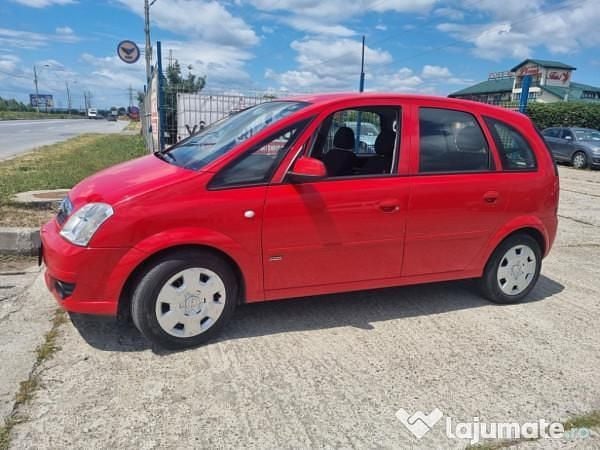 Rosu Utilizat 2010 Opel Meriva Monovolum | 2.950 EUR (Super Preț) - Imagine 1/4