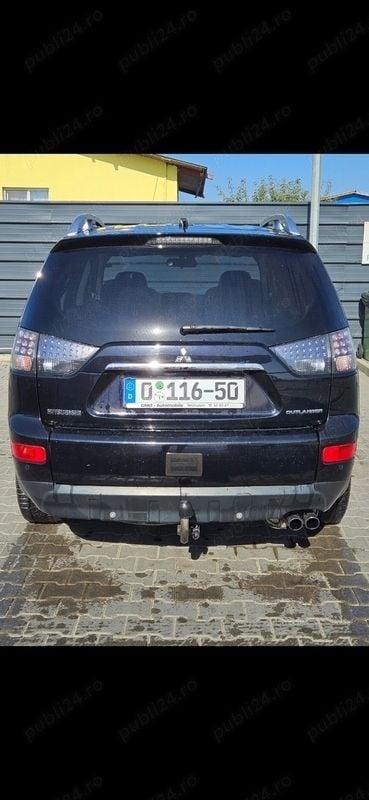 Second-hand Mitsubishi Outlander 140 CP (102 kW) 2009 Negru SUV