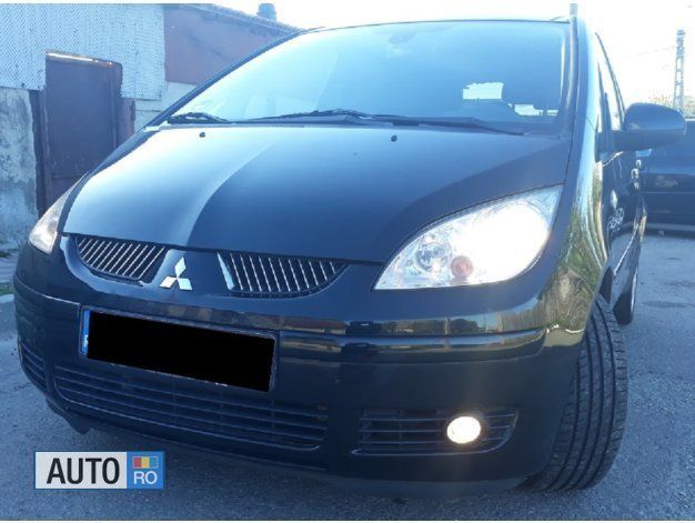 Second-hand Mitsubishi Colt 75 CP (55 kW) 2007 Negru Hatchback