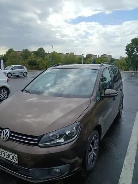 Utilizat 2012 VW Touran Monovolum | 6.800 EUR (Puțin scump) - Imagine 1/4
