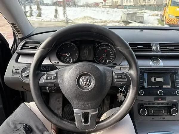Second-hand VW Passat 105 CP (77 kW) 2011 Negru Break