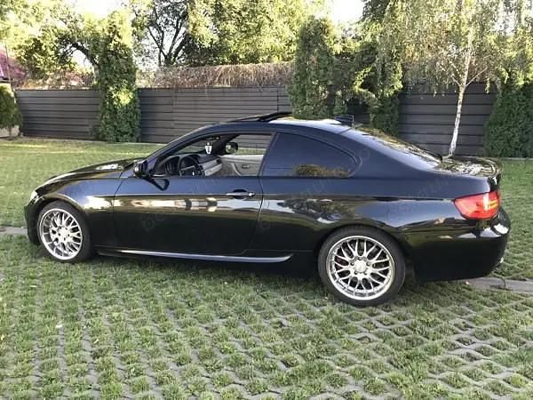 Second-hand BMW 330 Sport Line 320 CP (235 kW) 2011 Negru Coupe