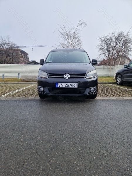Second-hand VW Caddy 75 CP (55 kW) 2011 Negru Monovolum