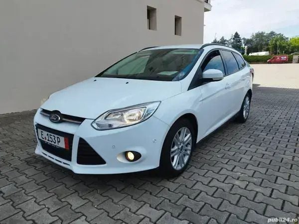 Utilizat 2014 Ford Focus Titanium Break | 4.090 EUR (Preț bun) - Imagine 1/4