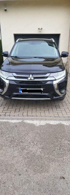 Negru Utilizat 2016 Mitsubishi Outlander P-HEV Berlinǎ | 13.500 EUR - Imagine 1/4