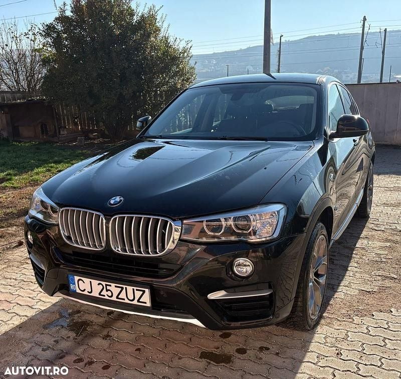 Culoarenegru Utilizat 2016 BMW X4 xLine SUV | 19.900 EUR (Preț bun) - Imagine 1/4