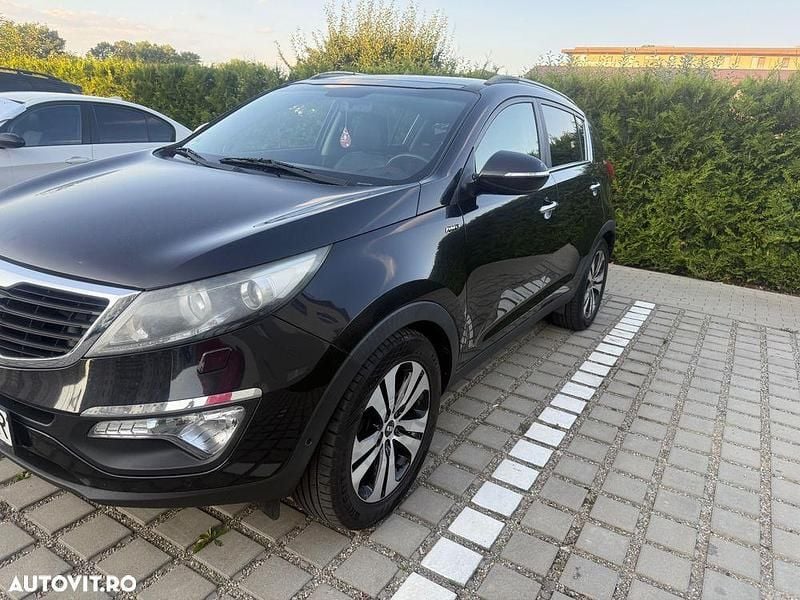 Culoarenegru Utilizat 2012 Kia Sportage SUV | 9.400 EUR (Preț OK) - Imagine 1/4