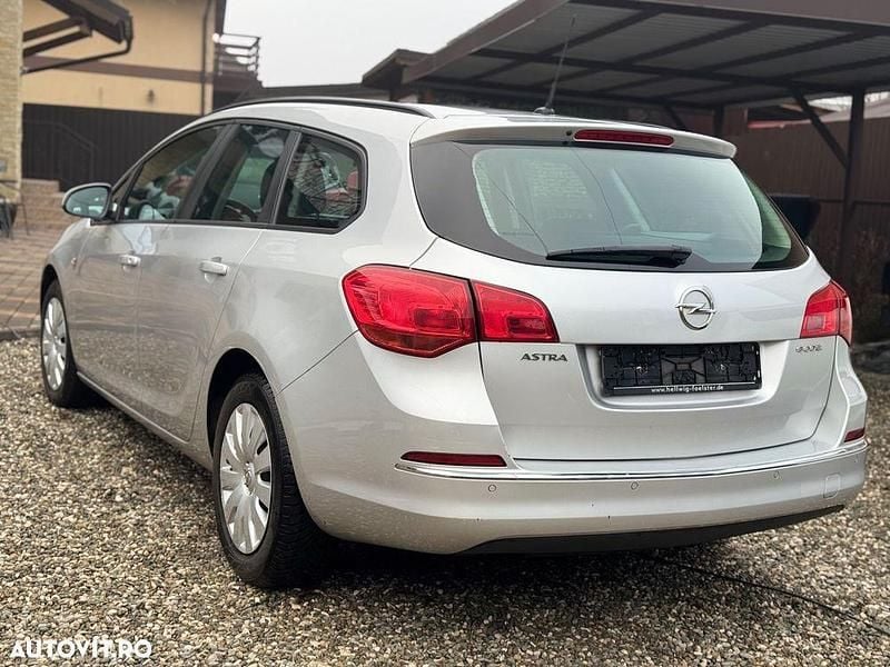 Second-hand Opel Astra Edition 95 CP (69 kW) 2013 Culoareargint Break
