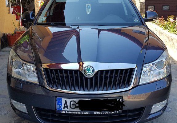 Gri Utilizat 2012 Skoda Octavia Break | 7.150 EUR (Puțin scump) - Imagine 1/4