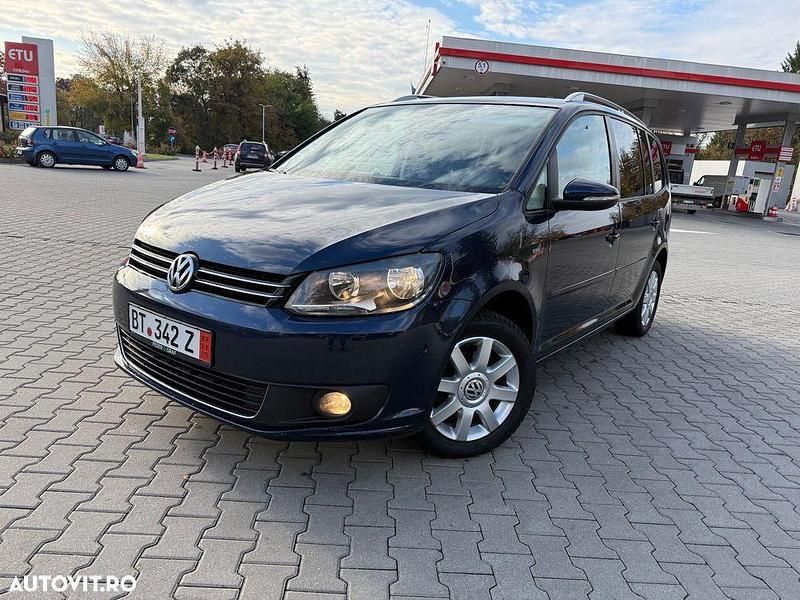 Culoarealbastru Utilizat 2014 VW Touran Life Monovolum | 5.999 EUR - Imagine 1/4