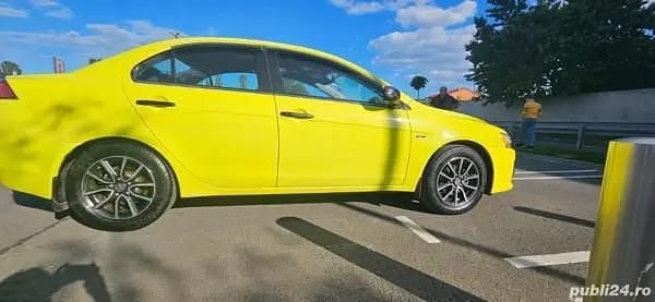 Second-hand Mitsubishi Lancer 117 CP (86 kW) 2017 Galben Berlinǎ