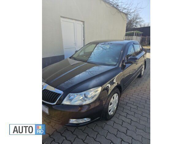 Second-hand Skoda Octavia 122 CP (89 kW) 2011 Negru Berlinǎ