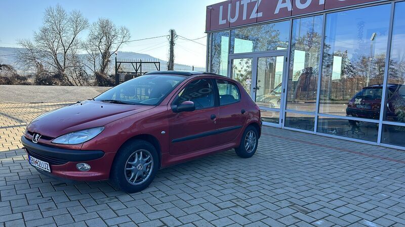 Rosu metalizat Utilizat 2001 Peugeot 206 Hatchback | 1.599 EUR - Imagine 1/4