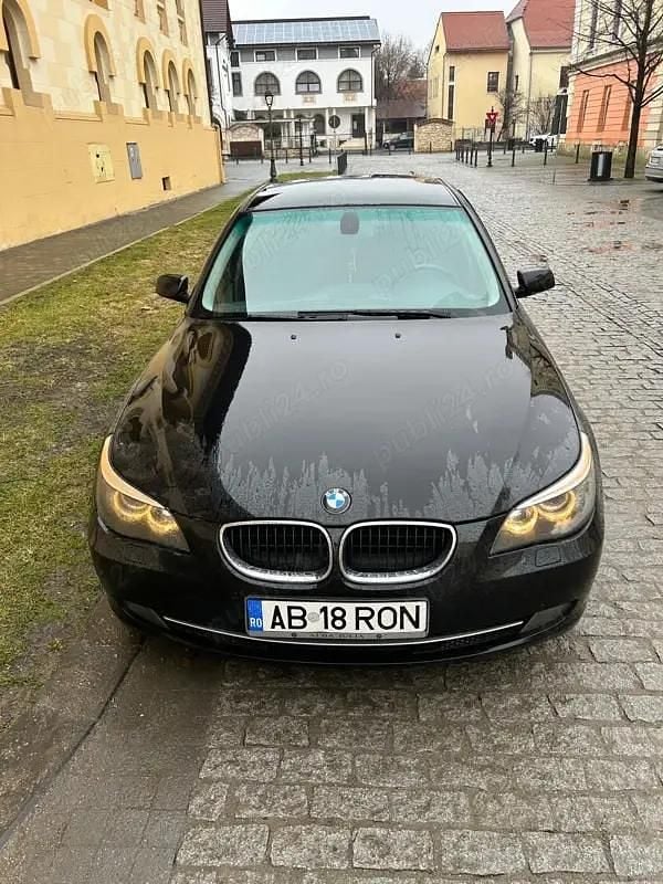 Second-hand BMW 520 177 CP (130 kW) 2009 Negru Berlinǎ