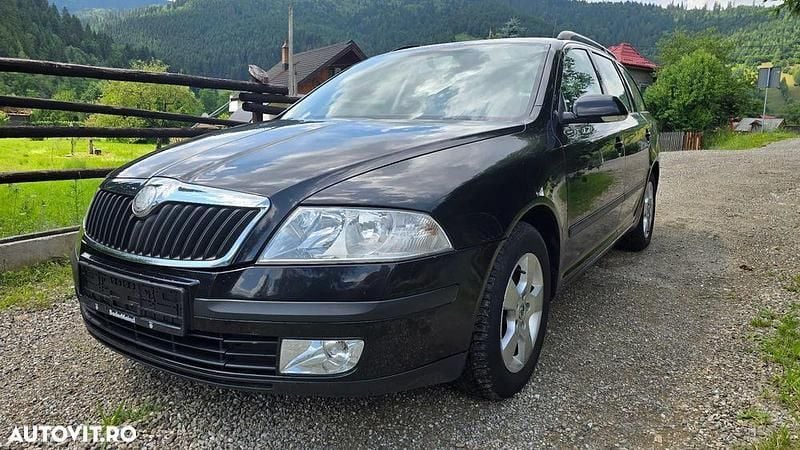 Culoarenegru Utilizat 2007 Skoda Octavia Elegance Break | 2.100 EUR (Super Preț) - Imagine 1/4