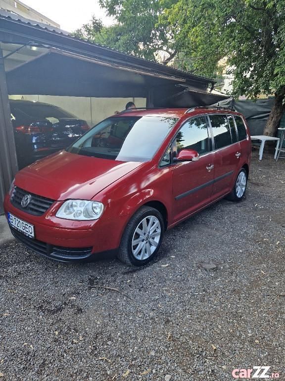 Alte culori Utilizat 2004 VW Touran Monovolum | 2.400 EUR (Puțin scump) - Imagine 1/4