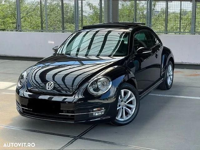 Culoarenegru Utilizat 2012 VW Beetle Design Coupe | 6.400 EUR (Preț bun) - Imagine 1/4