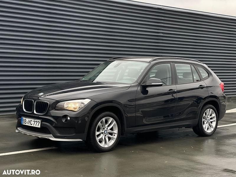 Culoarenegru Utilizat 2014 BMW X1 xLine SUV | 9.399 EUR (Super Preț) - Imagine 1/4