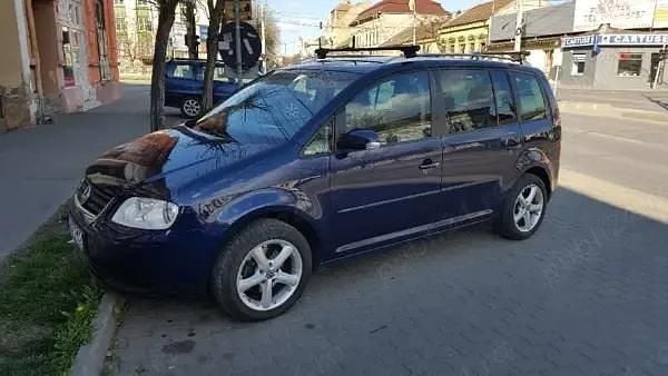Second-hand VW Touran 105 CP (77 kW) 2005 Albastru Monovolum