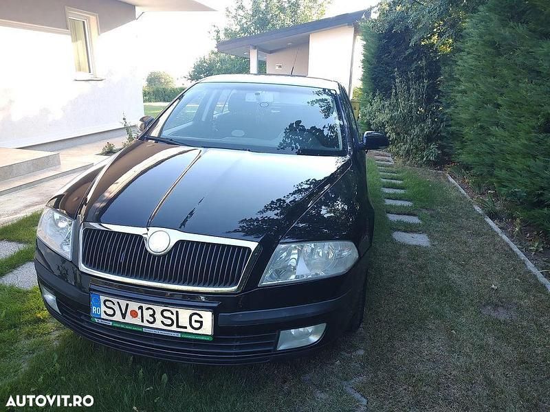 Culoarenegru Utilizat 2008 Skoda Octavia Elegance Berlinǎ | 2.600 EUR (Super Preț) - Imagine 1/4