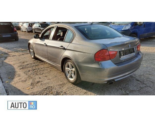 Second-hand BMW 320 143 CP (105 kW) 2009 Gri Berlinǎ