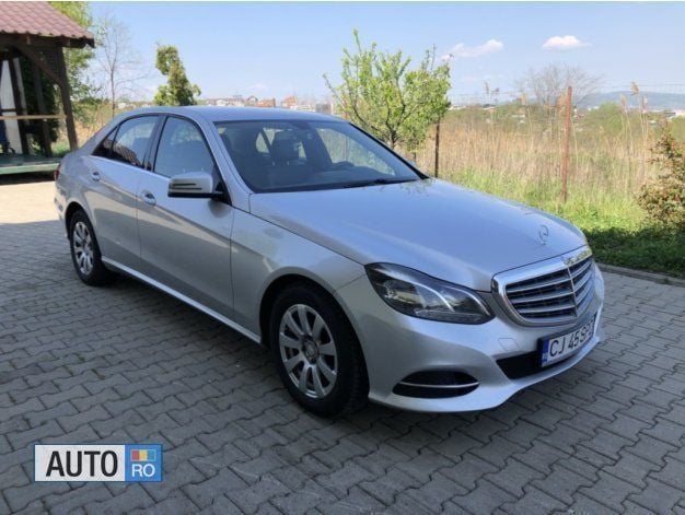 Second-hand Mercedes E200 136 CP (100 kW) 2014 Argintiu Berlinǎ