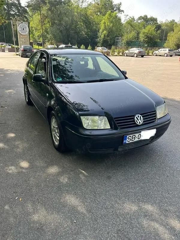 Second-hand VW Bora 101 CP (74 kW) 2001 Albastru Berlinǎ