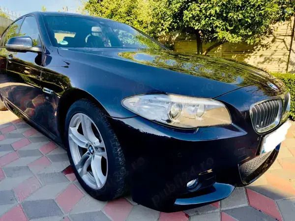Second-hand BMW 520 190 CP (139 kW) 2015 Albastru Berlinǎ