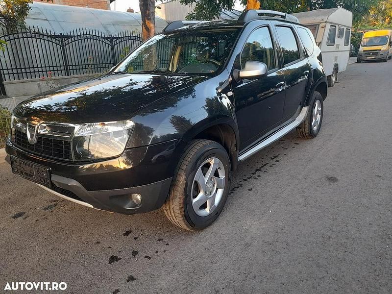 Culoarenegru Utilizat 2013 Dacia Duster Lauréate SUV | 6.600 EUR (Preț bun) - Imagine 1/4