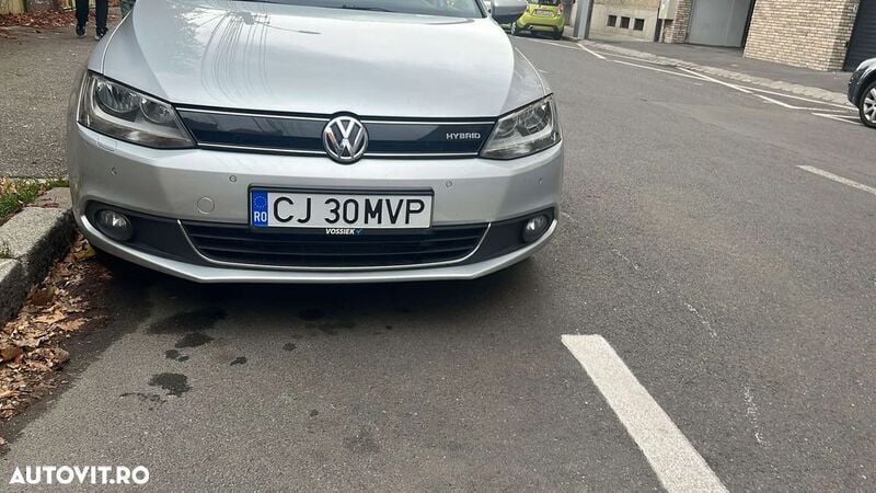 Gri Utilizat 2013 VW Jetta Hybrid Berlinǎ | 6.890 EUR - Imagine 1/4