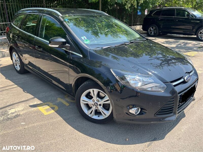 Negru Utilizat 2014 Ford Focus Titanium Break | 5.490 EUR (Preț bun) - Imagine 1/4
